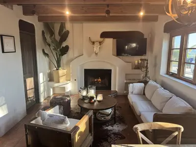 a living room with a couch and a fireplace at Luxury 5 bedroom Wine Retreat Fallbrook Villa sleeps 12 in Fallbrook