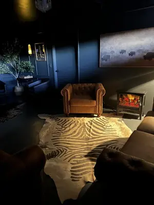 a living room with a couch and a fireplace at Luxury 5 bedroom Wine Retreat Fallbrook Villa sleeps 12 in Fallbrook