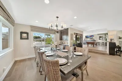 a dining room with a long table and chairs at Monthly 4BD4BA LuxuryHot TubPool TableYard in San Clemente