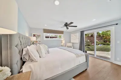 a bedroom with a bed and a ceiling fan at Monthly 4BD4BA LuxuryHot TubPool TableYard in San Clemente