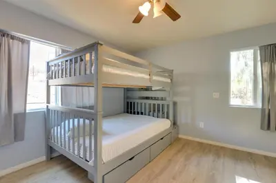 a bunk bed in a room with a ceiling fan at Hike, Explore and More Ranch Retreat in Escondido! in Valley Center