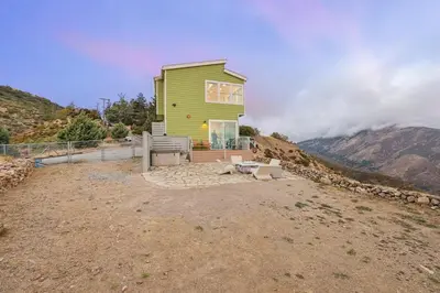 a green house sitting on top of a hill at Unique Mountain Gem-Sauna Hot Tub Scenic View in Julian