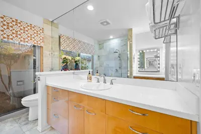 a bathroom with a sink and a toilet at Nature-Inspired Stay with Pool, Fire Pits and More in El Cajon