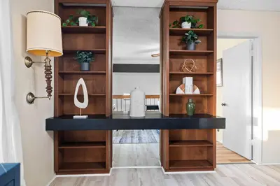 a desk in a room with a lamp at Mira Mesa Family Retreat 4BR with Balcony and Firepit in San Diego