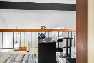 a table with a ball on top of it in a room at Mira Mesa Family Retreat 4BR with Balcony and Firepit in San Diego