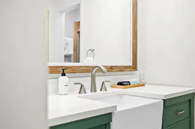 a bathroom with a sink and a mirror at Charming Coastal Retreat in Solana Beach in Solana Beach