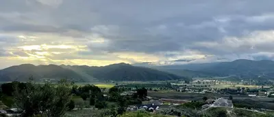 a view of a town with mountains in the background at Cozy Camper with Fire Pit and Beautiful Sunsets in California in Temecula