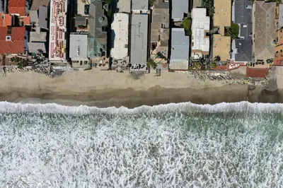 an aerial view of the beach and the ocean at Private beach toes on the Sand Waterworld in Dana Point