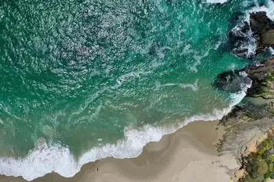 an aerial view of the ocean and a beach at Penthouse Steps from Victoria Beach 180 degree ocean views in Laguna Beach