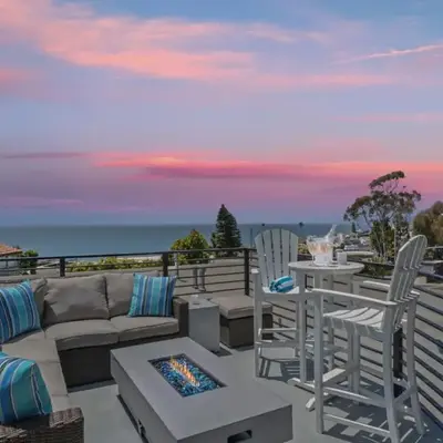 Penthouse Steps from Victoria Beach 180 degree ocean views