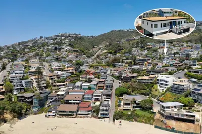 an aerial view of a city with houses on a hill at Ocean VIEWS Steps from Victoria Beach Lux Design in Laguna Beach