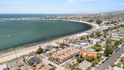 an aerial view of a beach and a city at Pacific Beach Rooftop Views in San Diego