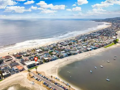 an aerial view of a beach with houses and boats at Boardwalk Studio Shared Hot Tub and Patio in San Diego