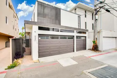 an image of a garage door in a house at Boardwalk Studio Shared Hot Tub and Patio in San Diego