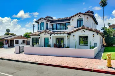a house on a street with a yellow fire hydrant at Inviting 3BR Space with Firepit in San Clemente
