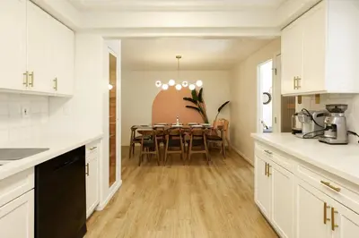 a kitchen and dining room with a table and chairs at Casa Ciela, AC,Spa,15 min Downtown, Beach, Theatre in San Diego