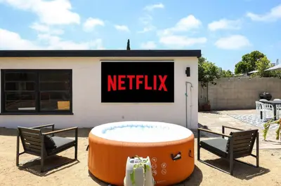 a restaurant with a hot tub in front of a building at Casa Ciela, AC,Spa,15 min Downtown, Beach, Theatre in San Diego