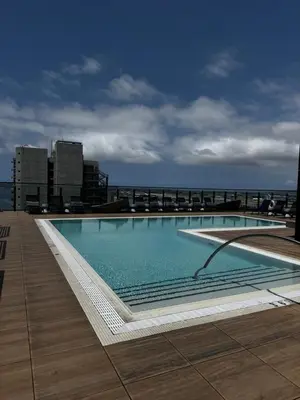 a swimming pool on the roof of a building at The zinnia-Downtown SDiego Marina View Stay in San Diego