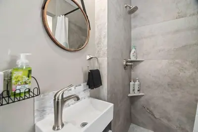 a bathroom with a sink and a mirror at #755 2B2B Beach Getaway!Ground Level w/Patio&Grill in San Diego