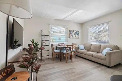 a living room with a couch and a table at #759 PetFriendly Beachside retreat/laundry&Parking in San Diego