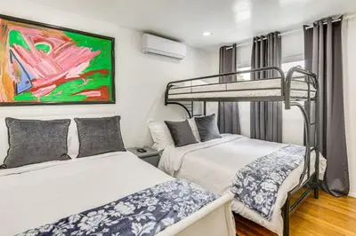 a bedroom with two beds and a bunk bed at Home 3 Miles to Balboa Park and San Diego Zoo! in San Diego
