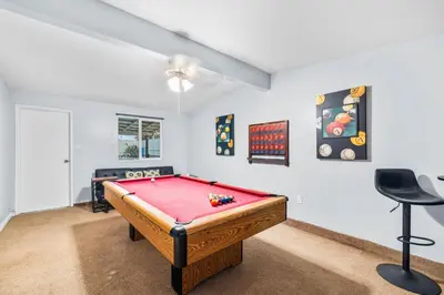 a room with a pool table in it at Serene Sanctuary Pool, Hot Tub and Game Room in San Diego