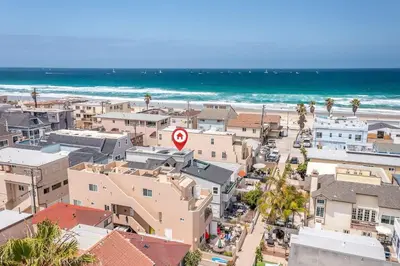 an aerial view of a city with the ocean at Steps From the Beach & Belmont in San Diego
