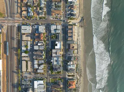 an overhead view of houses on a beach at King Suite - 2min Walk to Beach Close to Downtown! in Oceanside