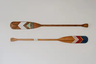 a pair of wooden skis on a white background at King Suite - 2min Walk to Beach Close to Downtown! in Oceanside
