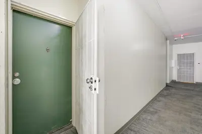 an empty corridor with a green door in a room at Golden Hill Gem 2 Mi to Gaslamp Quarter - Dogs OK! in San Diego