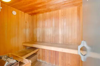 a wooden sauna with a wooden bench in a room at Golden Hill Gem 2 Mi to Gaslamp Quarter - Dogs OK! in San Diego
