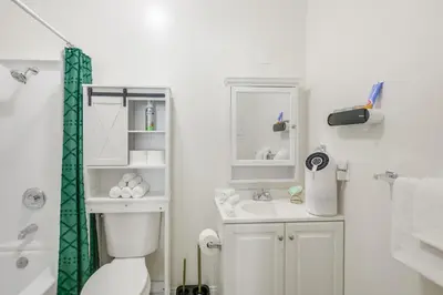 a bathroom with a toilet and a sink at Golden Hill Gem 2 Mi to Gaslamp Quarter - Dogs OK! in San Diego