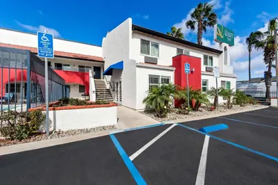 an empty parking lot in front of a hotel at Quality Inn San Diego South - Chula Vista in Chula Vista