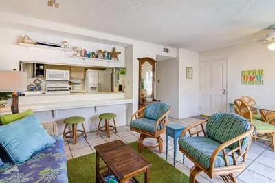 a living room with a couch and chairs and a table at Family Beach House Steps From Sand W Oceanview Patio By Beachview Rentals in Newport Beach