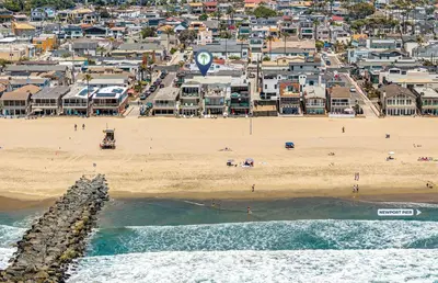 an aerial view of a beach with a city at Ultimate Coastal Retreat Seconds From Sand W Oceanviews By Beachview Rentals in Newport Beach