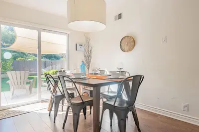 a dining room with a table and chairs at Family Retreat - Legoland & Beach in Oceanside