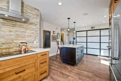 a kitchen with a sink and a counter top at Fresh & Modern 3BR - Just Blocks from Beach in Encinitas