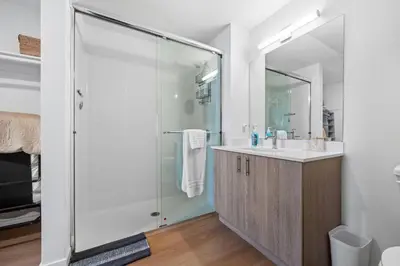 a bathroom with a shower and a sink at King Bed + Fire Pit | Top Floor w/ Epic Views in San Diego