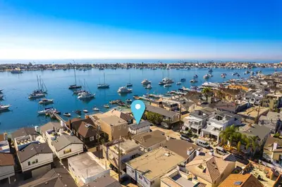 an aerial view of a harbor with boats at Balboa Island Gem with Patio & Beach Essentials in Newport Beach