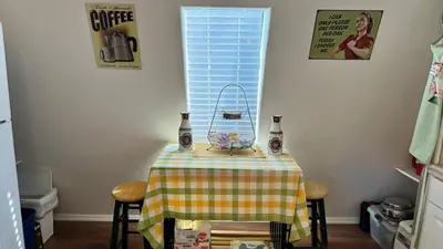 a table with two bottles on it in a kitchen at Julian Barn-Partment in Santa Ysabel