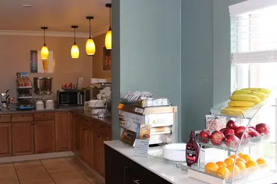 a kitchen with a counter with fruit on it at Best Western PLUS La Mesa San Diego in La Mesa