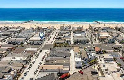 an aerial view of a city and the beach at Pet-Friendly 3Br W Oceanview Balcony, Only Steps To Sand By Beachview Rentals in Newport Beach