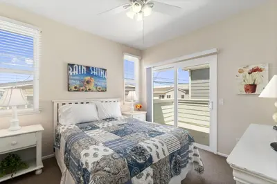 a bedroom with a bed and a window at 3Br Oceanview W Prime Peninsula Location Near Beach By Beachview Rentals in Newport Beach