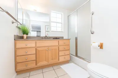 a bathroom with a sink and a shower at Pet-Friendly 3Br W Ac, Oceanview Patio, Steps From Beach By Beachview Rentals in Newport Beach