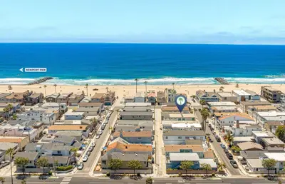 an aerial view of a beach with houses and the ocean at Remodeled 3Br W Oceanview Patio, Ac, 4 Houses From Sand By Beachview Rentals in Newport Beach