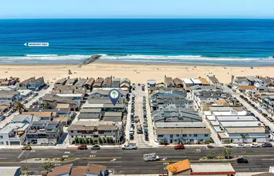 an aerial view of a city and the beach at Charming Oceanview 3Br Half Block To 29Th St Beach By Beachview Rentals in Newport Beach