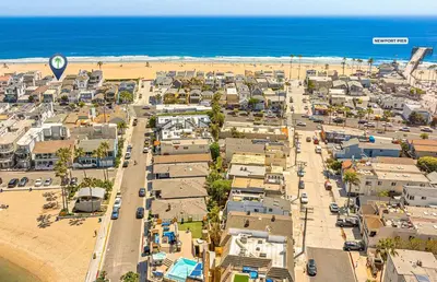 an aerial view of a town next to the beach at 3Br Oceanfront In Desirable Location At Excellent Value By Beachview Rentals in Newport Beach
