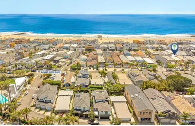 an aerial view of a city with the ocean at Affordable 3Br Near Beach, Walk To Shops, Dining And More By Beachview Rentals in Newport Beach
