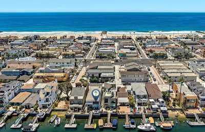 an aerial view of a city with boats in the water at Stylish 3Br Bayfront Home W Balcony And Waterfront Views By Beachview Rentals in Newport Beach