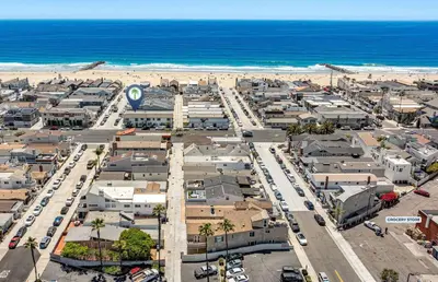 an aerial view of a city with the beach at Remodeled 7Br Duplex Near Beach, Shops, And Dining By Beachview Rentals in Newport Beach